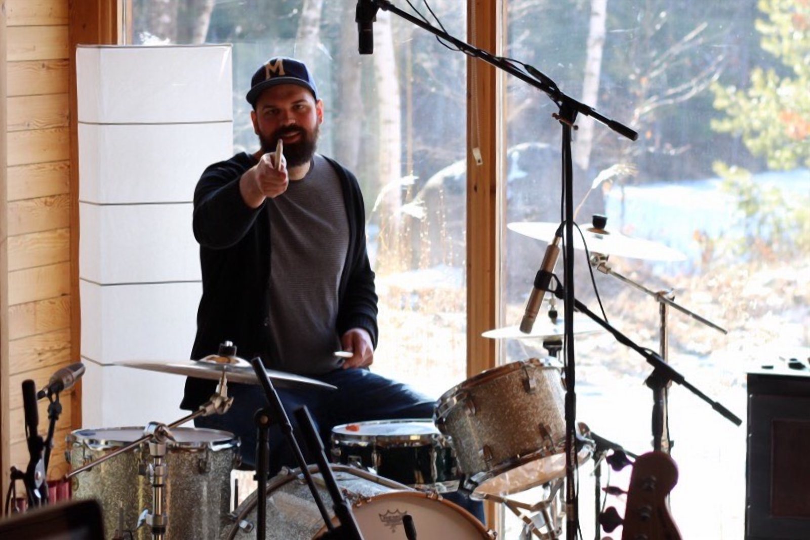 Drummer tracking behind the kit